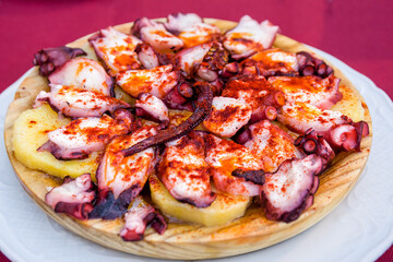 Galician octopus on wooden plate