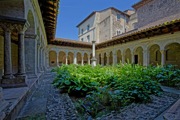 VIENNE, FRANCE, May 26, 2023 : Cloister of Saint-Andre-le-Bas, founded in the 8th century by Duke Ansemond. Cloister and chapel are all remainings of ancient abbey.