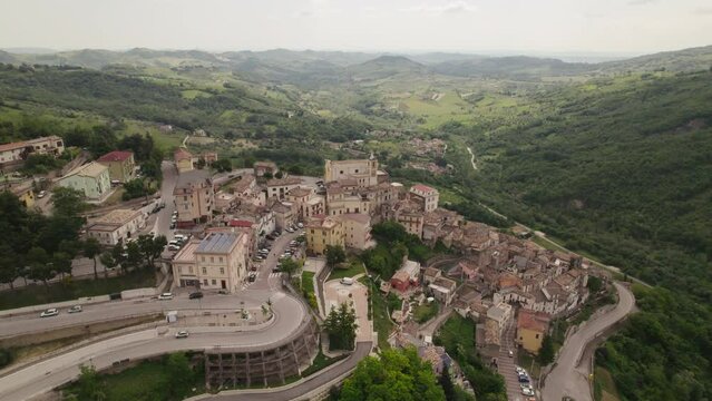 Little typical village up a mountain and green valley in the Abruzzo region of Italy