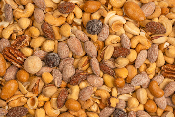 A group of almonds, pistachios, walnuts, macadamia, cashews.