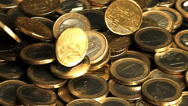 Slow falling euro coins. Filmed is slow motion 1000 fps. High quality FullHD footage