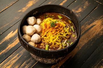 Yummy yellow noodles with pork ball