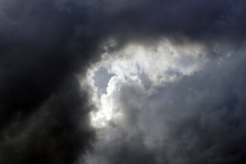 Obraz premium darkened sky,storm and rain clouds in the sky,dark clouds and sky,close-up dark clouds,