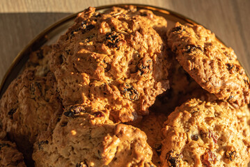 Oatmeal Cookies with raisins on a platter close-up.
