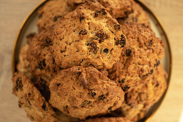 Oatmeal Cookies with raisins on a platter close-up.