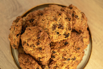 Oatmeal Cookies with raisins on a platter close-up.