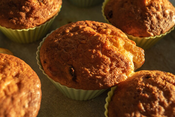 Homemade muffins on a tray in silicone molds.