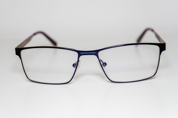 Closeup of modern optical glasses isolated on a white background for product photography