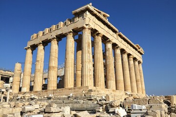 Low angle shot of the Acropolis against a cloudless blue sky in Athens, Greece