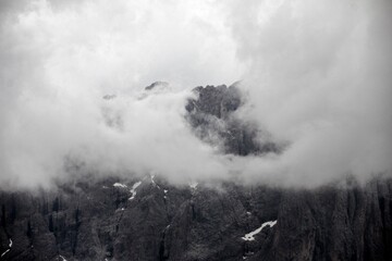 Heavy clouds over the rocky mountains in South Tyrol, Italy