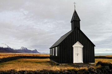 Aerial view of black Budakirkja church in Iceland