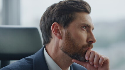 Businessman thinking business ideas sitting at office close up. Manager worried.