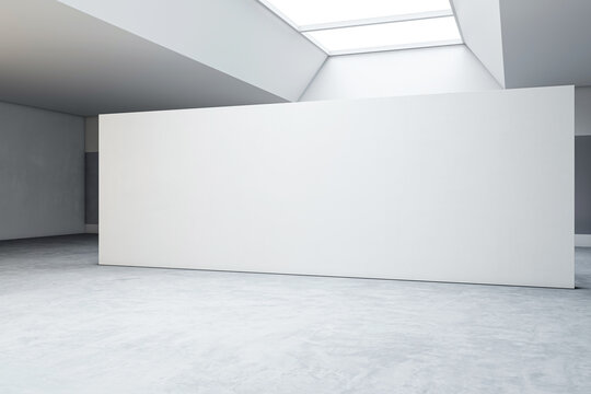 Perspective view of modern bright gallery with blank white wall background and concrete grey floor. 3D Rendering, mockup