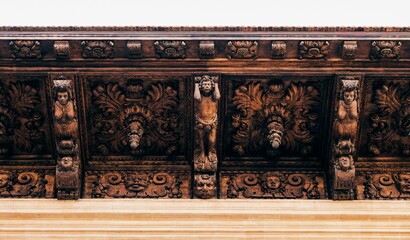Low angle of decorated statues on the roof of City Council of Palma in the Old Town