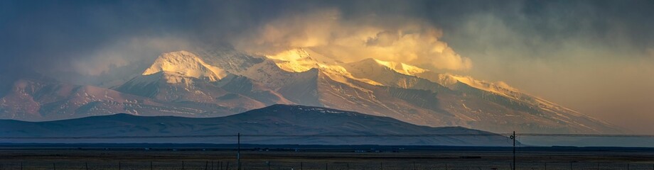 Panoramic view of the sunset with Gurla Mandhata peak in Himalayas, Taqin County, Tibet, China