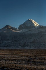 Vertical shot of the snowy Mount Kailash in Taqin County, Ali Prefecture, Tibet, China