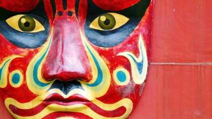 Close up of a bright folk mask