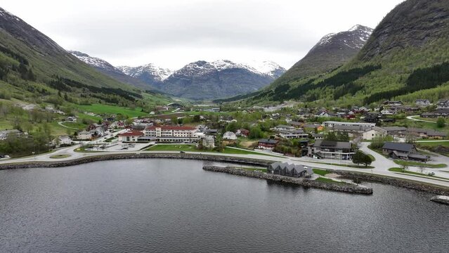 Skei village along road E-39 in Sunnfjord Norway - Backward moving aerial over Jolstravatnet freshwater lake