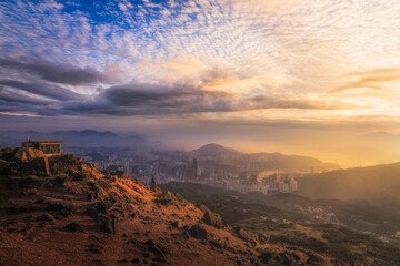 Beautiful view of a foggy town during a sunrise