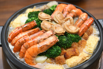 Poon Choi or Pen Cai, traditional Cantonese dish comprised of a number of ingredients