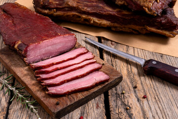 Dried meat on a wooden cutting board