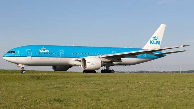 Boeing 777-300 of KLM Royal Dutch Airlines taxing for departure at Amsterdam Schiphol Airport.
