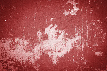 Red distressed paint texture for design.