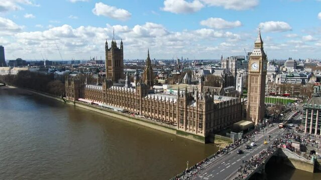 Aerial drone rotating shot of Big Ben and the Houses of Parliament