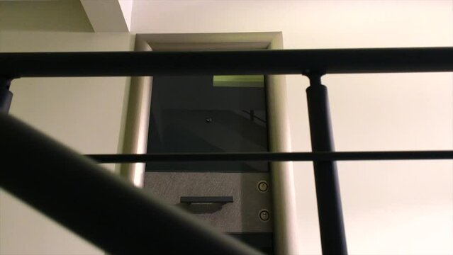 view of the outer door of the house going down from the top