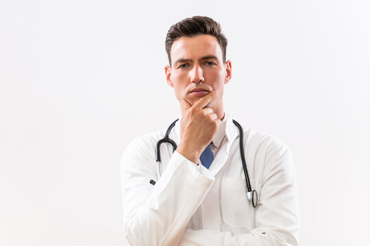 Image of worried doctor thinking .	