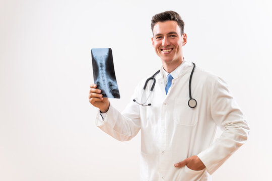 Portrait of doctor doctor holding x-ray image .