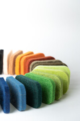 Samples of acoustic polyester material in different colors - obrazy, fototapety, plakaty