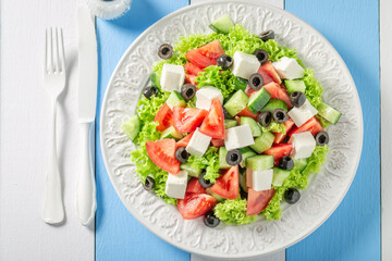 Full of vitamins Greek salad with tomatoes, cheese and lettuce.