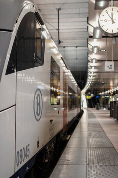 Vertical shot of a NMBS SNCB train in the underground railway station of Antwerp, Belgium