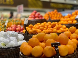 Orange and apple stalls at the supermarket 
