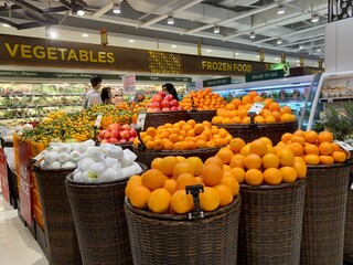Orange and apple stalls at the supermarket 