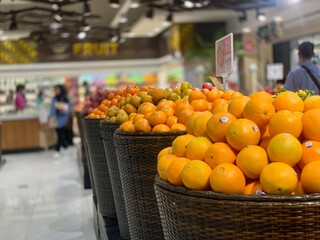 Orange and apple stalls at the supermarket 