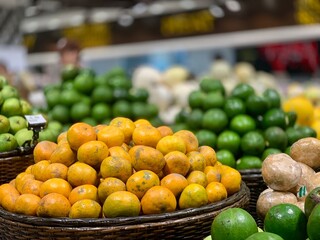 Orange and apple stalls at the supermarket 