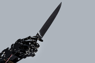 Real robot's hand with sharp knife. Concepts of Technological singularity and robotic process...
