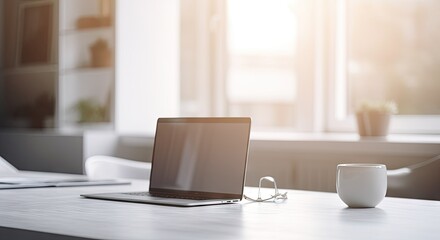Fototapeta premium Modern Office Workspace. Laptop on a Business Desk in a Stylish Room