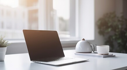 Fototapeta premium Modern Office Workspace. Laptop on a Business Desk in a Stylish Room