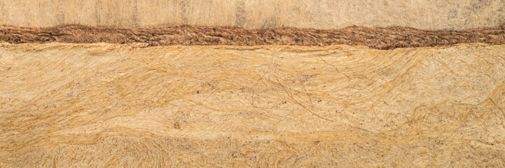 abstract landscape - background of buckskin amate bark paper handmade created in Mexico, panorama banner