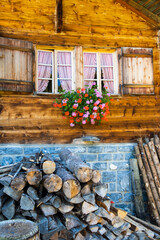 Fototapeta na wymiar Traditional swiss house in mountain valley Kiental. Tourist and sport attraction of Switzerland.