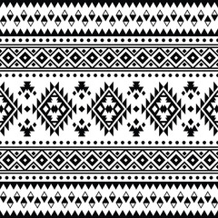 Seamless tribal Navajo pattern. Folk geometric abstract repeating background in ethnic style. Black and white colors. Design for textile, fabric, clothing, curtain, rug, ornament, wrapping.