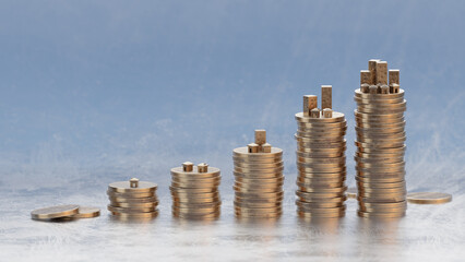 Coin stacks, money grow up