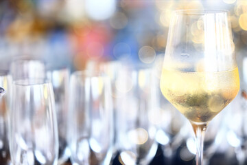 white wine tasting, chilled ice wine in a cold glass in summer