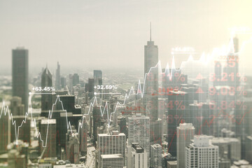 Multi exposure of virtual creative financial chart hologram on Chicago skyscrapers background, research and analytics concept