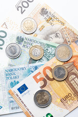polisch currency zloty and euro currency coins and banknotes