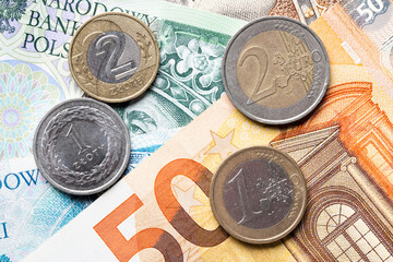 polisch currency zloty and euro currency coins and banknotes