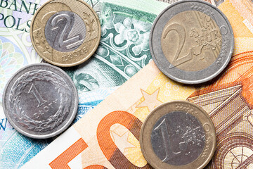 polisch currency zloty and euro currency coins and banknotes
